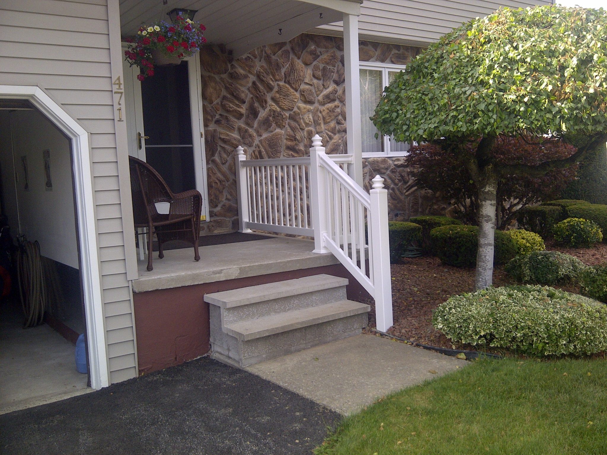 North Utica, NY Porch Improved with Newport Railing Poly Enterprises